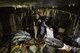 Staff Sgt. Jerrick Gentz and Senior Airman Justin Mickle, both assigned to the 52nd Logistics Readiness Squadron, separate and collect scrap metal and debris in Fort Aubin-Neufchateau, Belgium, Aug. 28, 2016. The removal of scrap metal and debris from the bunker rooms will help open more of the bunker for the public tours. (U.S. Air Force photo/Staff Sgt. Jonathan Snyder)