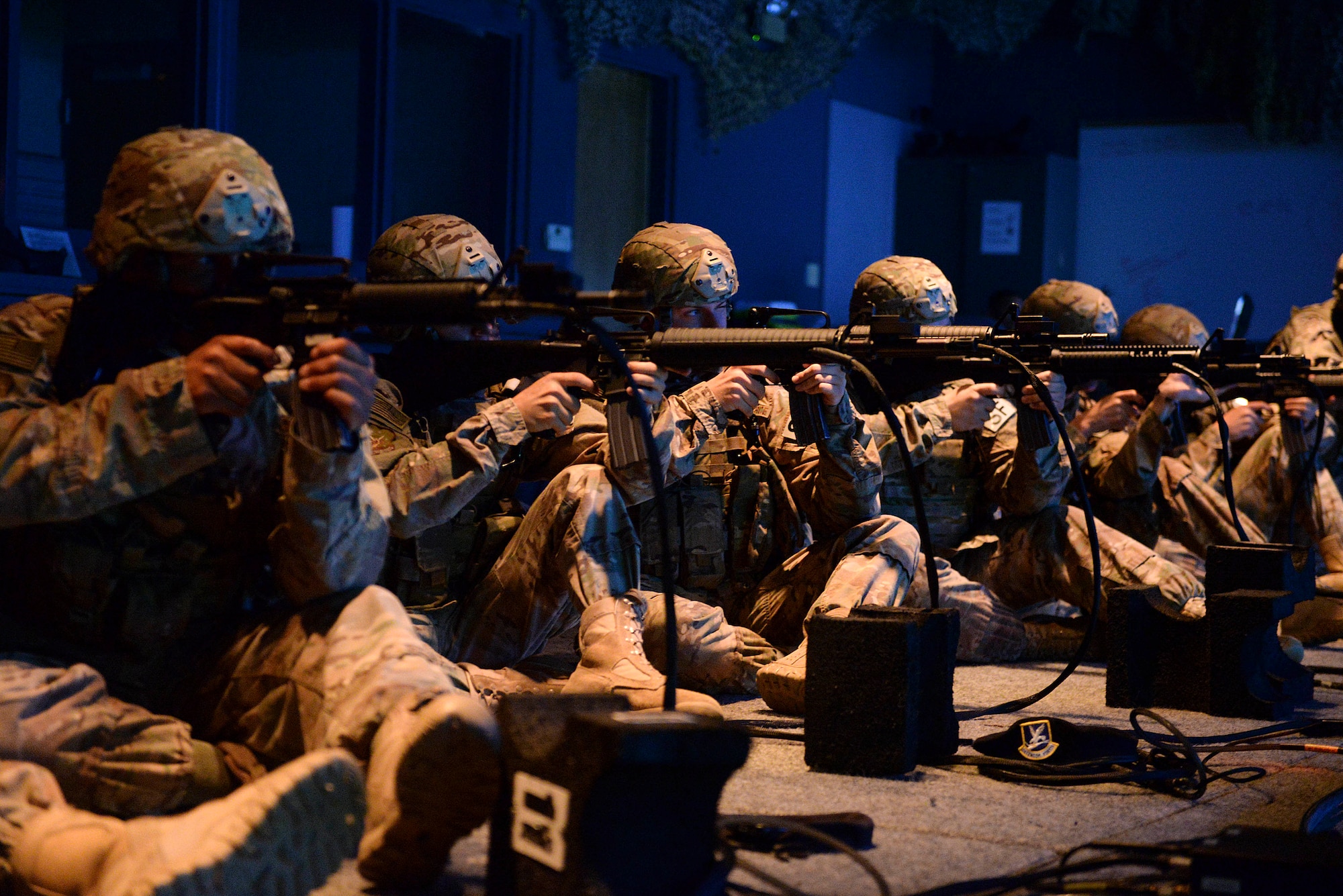 Airmen from the 91st Missile Security Forces Squadron use the U.S. Army’s Engagement Skills Trainer 2000 at the Camp Grafton Training Center in Devils Lake, N.D., Sept. 7, 2016. The EST 2000 is a firearms training simulator that allows Airmen to focus on firing position, breathing and sight alignment. (U.S. Air Force photo/Airman 1st Class Jessica Weissman)