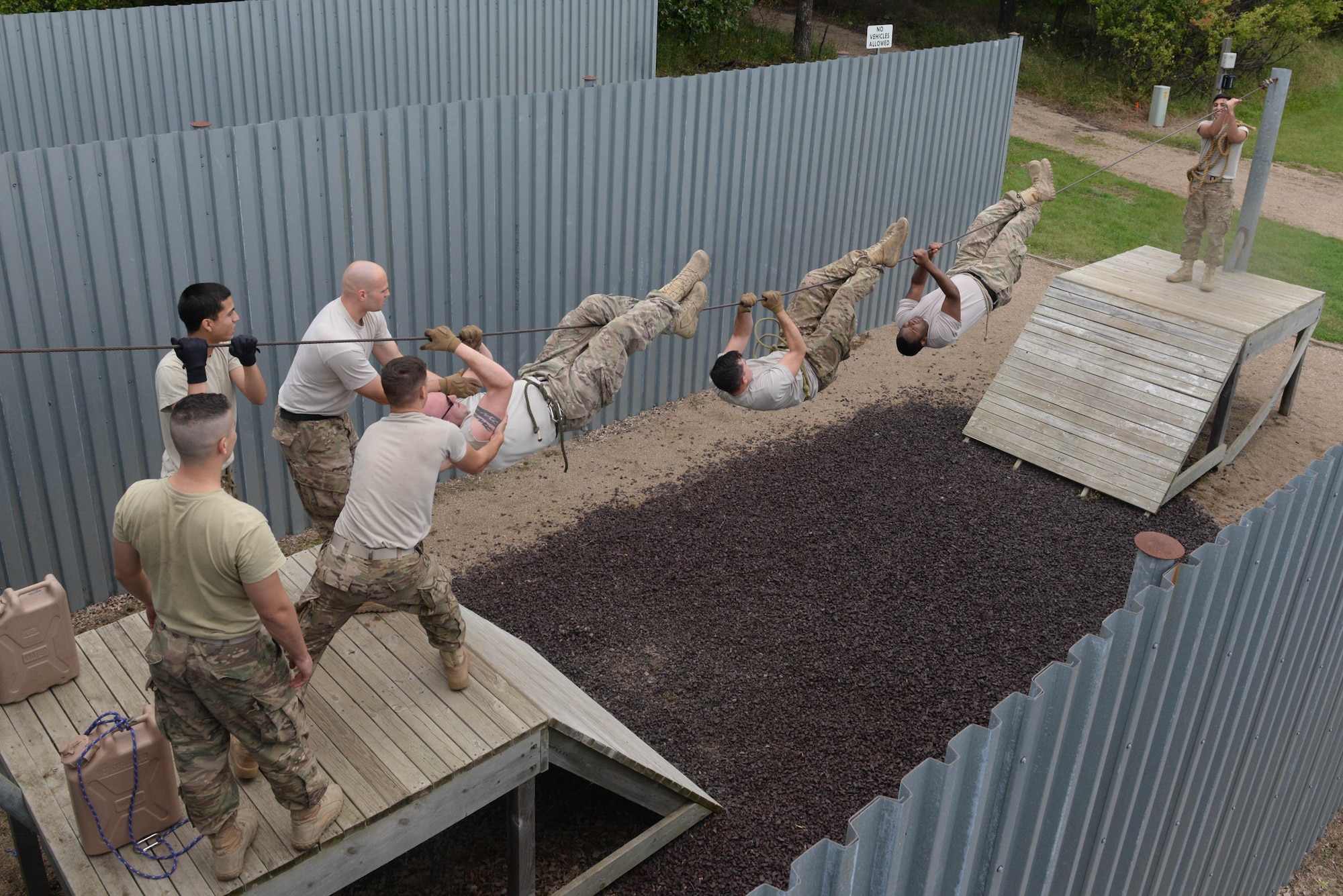 Airmen from the 91st Missile Security Forces Squadron participate in a leadership reaction course at the Camp Grafton Training Center in Devils Lake, N.D., Sept. 7, 2016.Various obstacles were presented to Airmen to increase communication and leadership within the unit. (U.S. Air Force photo/Airman 1st Class Jessica Weissman)