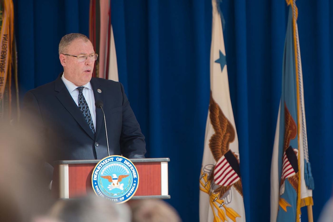 Deputy Defense Secretary Bob Work speaks during a remembrance ceremony in the Pentagon Courtyard marking the 15th anniversary of 9/11, Sept. 9, 2016. DoD photo by Army Sgt. Amber I. Smith
