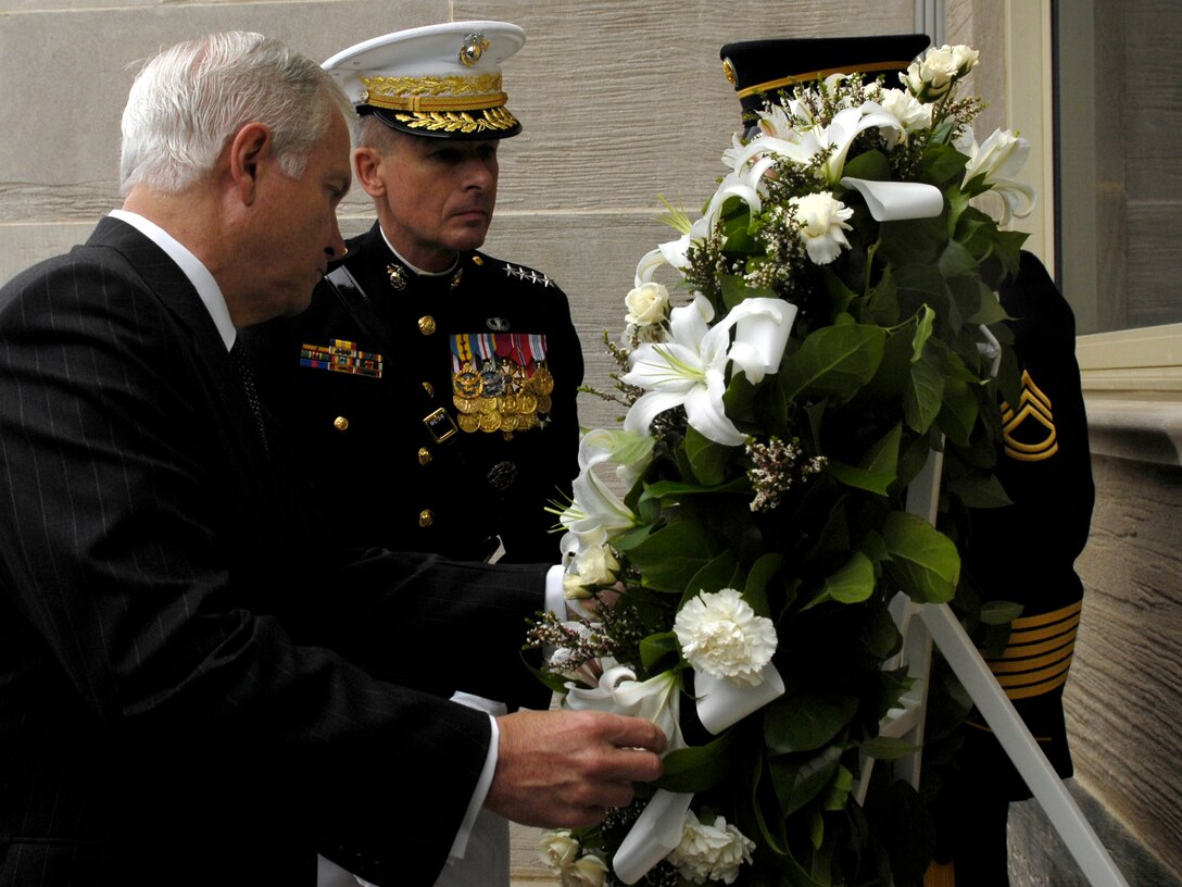 Defense Secretary Robert M. Gates, left, and Marine Corps Gen. Peter Pace, chairman of the Joint Chiefs of Staff, participate in an wreath laying ceremony at the Pentagon to mark the sixth anniversary of the 9/11 attacks, Sept. 11, 2007. DoD photo by Cherie A. Thurlby