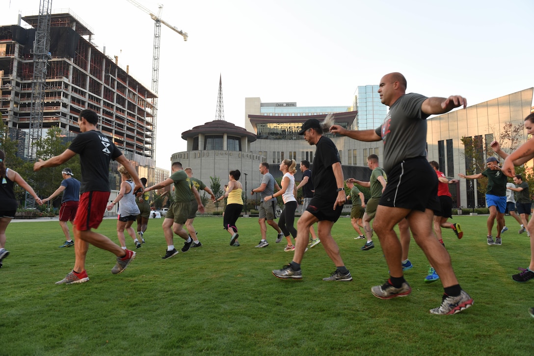 A group of Nashville residents conduct physical training with the Marines, Sept. 8, 2016, during the public PT event at the Walk of Fame Park in downtown Nashville as part of Marine Week. More than 700 Marine are participating in Marine Week Nashville to give the citizens of the greater Nashville area the opportunity to meet the individual Marine and celebrate community country, and Corps.