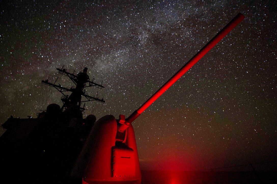 The MK 45 5-inch lightweight gun and superstructure extends from the USS Carney in the Mediterranean Sea, Sept. 6, 2016. The Carney, a guided-missile destroyer, is patrolling in the U.S. 6th fleet area of operations to support U.S. national security interests in Europe. Navy photo by Petty Officer 3rd Class Weston Jones

