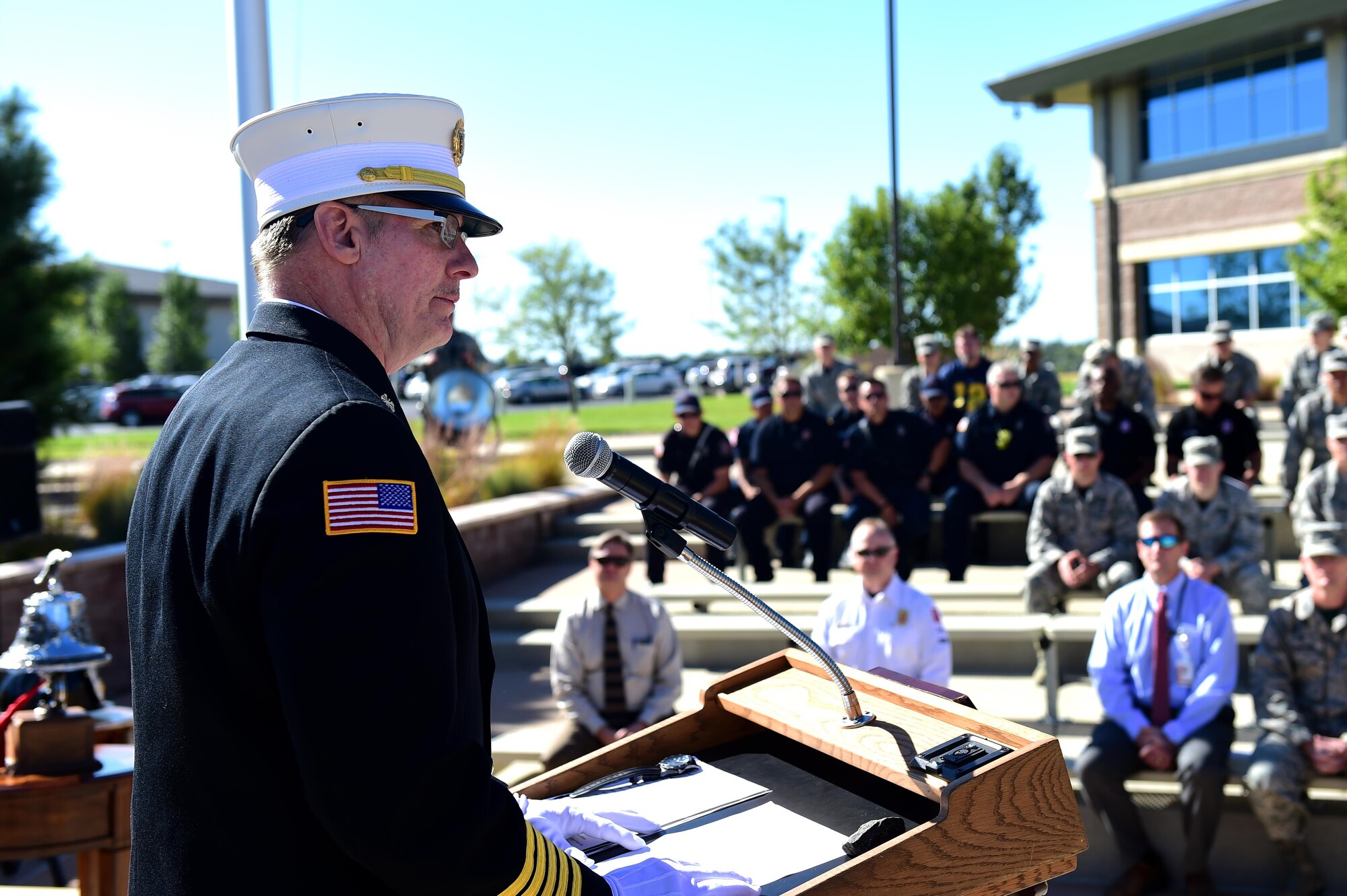Tim Bosch, 460th Civil Engineer Squadron fire department chief, speaks during a Patriot Day ceremony Sept. 9, 2016, on Buckley Air Force Base, Colo. At 8:46 a.m., the time that the first plane flew into the World Trade Center on Sept. 11, 2001, many people across the United States take part in a moment of silence. (U.S. Air Force photo by Airman 1st Class Gabrielle Spradling/Released)