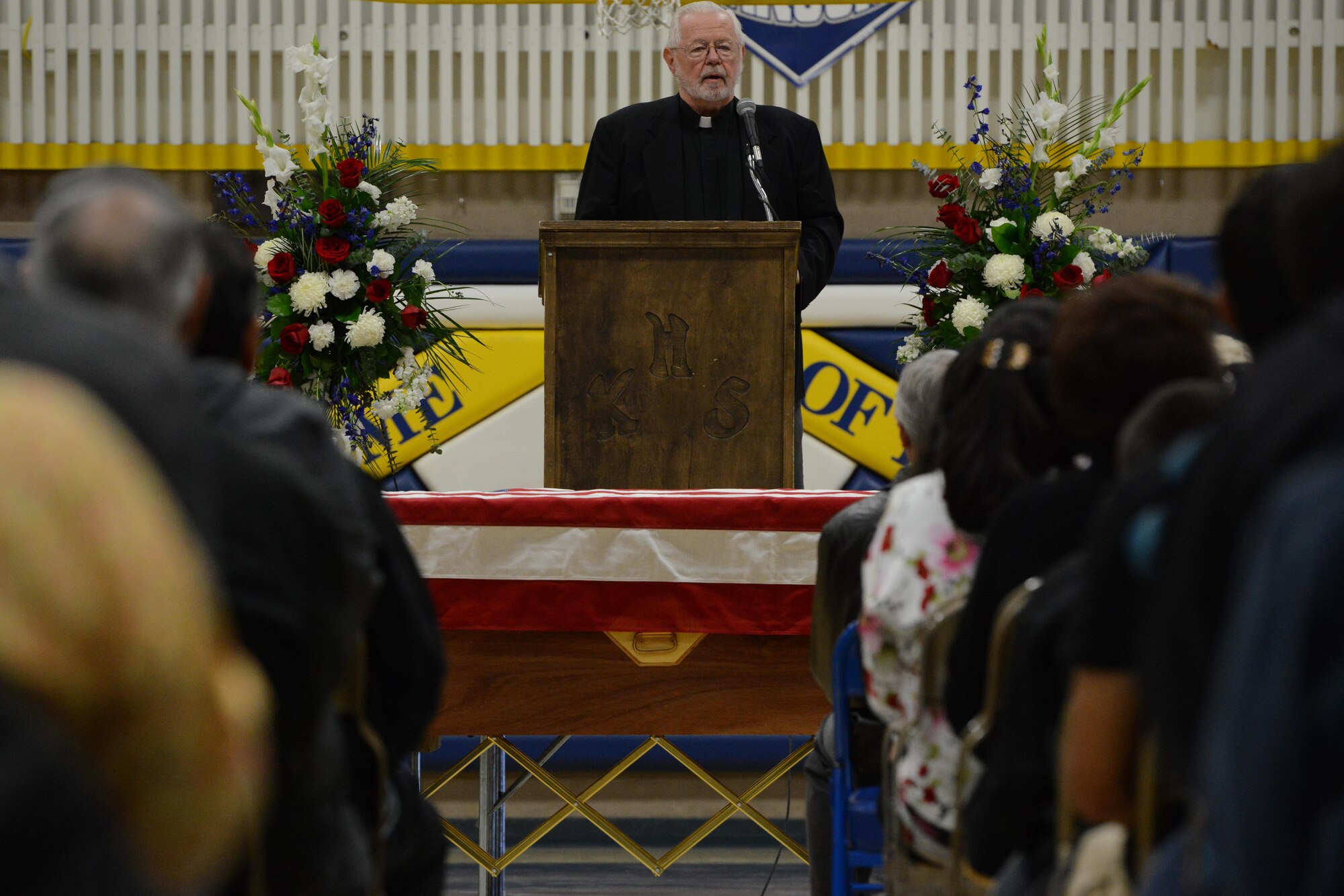 Father John Hinsvark speaks during the memorial service of former Alaska Adjutant General Maj. Gen. John Schaeffer Jr, at Kotzebue, Alaska, Aug. 31, 2016. Schaeffer enlisted in the Alaska National Guard in 1957, and served for 34 years.  Schaeffer was the first Alaska Native two-star general of the Alaska National Guard and commissioner of the Alaska Department of Military and Veterans Affairs. He is survived by Mary his wife of 56 years. (U.S. Air Force photo by Airman 1st Class Javier Alvarez)
