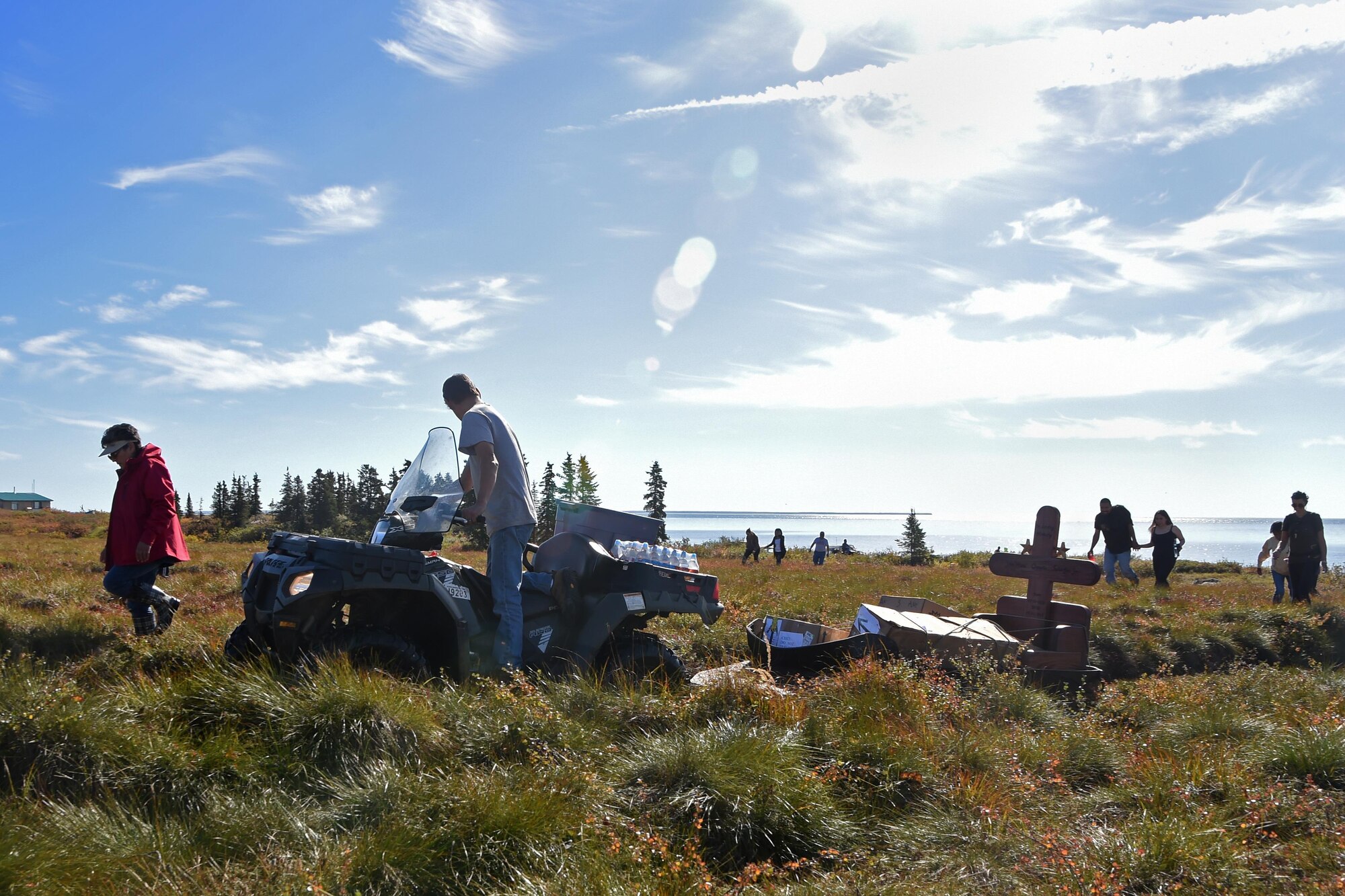 The grave marker of former Alaska Adjutant General Maj. Gen. John Schaeffer Jr, is transported by all-terrain vehicle at Ivik, Alaska, Aug. 31, 2016. Schaeffer enlisted in the Alaska National Guard in 1957, and served for 34 years.  Schaeffer was the first Alaska Native two-star general of the Alaska National Guard and commissioner of the Alaska Department of Military and Veterans Affairs. He is survived by Mary his wife of 56 years. (U.S. Air Force photo by Airman 1st Class Javier Alvarez)