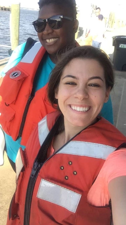 Jamie Parello (front),  a pathways intern from,  Brandeis University, and Simone Johnson , a pathways intern from Virginia State University, pause to take a selfie while learning about the Norfolk District operations mission in the Elizabeth River near Norfolk, Virginia. The Pathways program offers three types of internship opportunities to individuals who are just starting out in their potential federal careers: the Internship Program, Recent Graduates Program and Presidential Management Fellows Program. (U.S. Army photo/Jamie Parello)