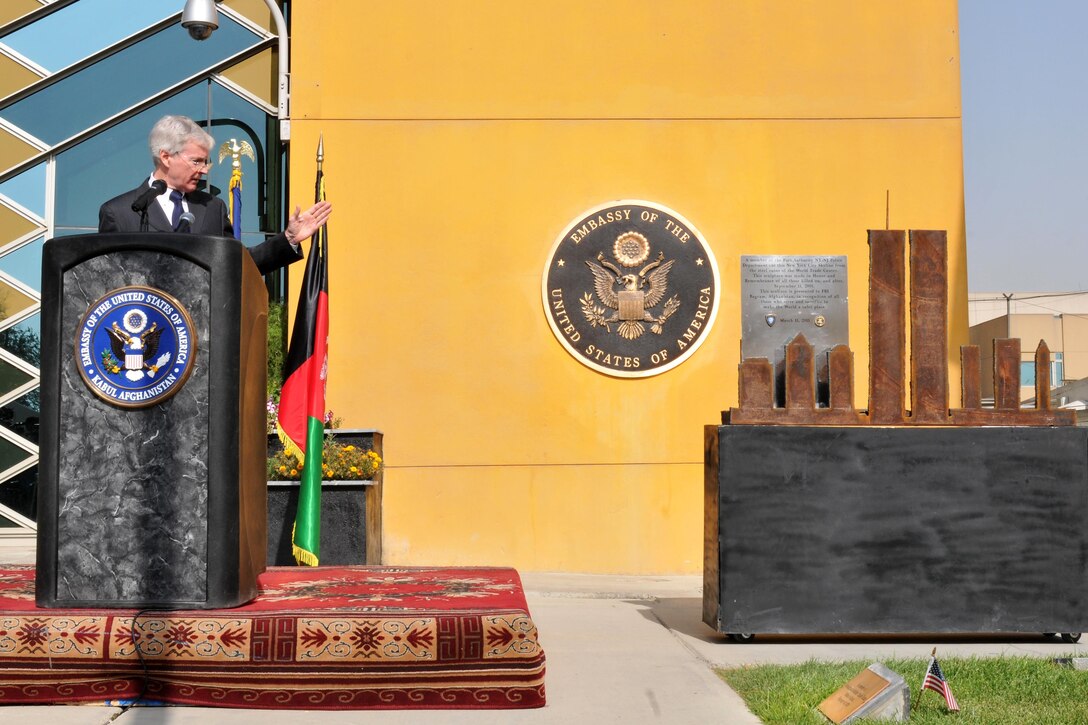 U.S. Ambassador to Afghanistan Ryan C. Crocker speaks about a steel sculpture depicting the lower Manhattan skyline during a 9/11 commemoration ceremony at the U.S. Embassy in Kabul, Afghanistan, Sept. 11, 2011. U.S. Air Force photo by Master Sgt. Michael O'Connor 