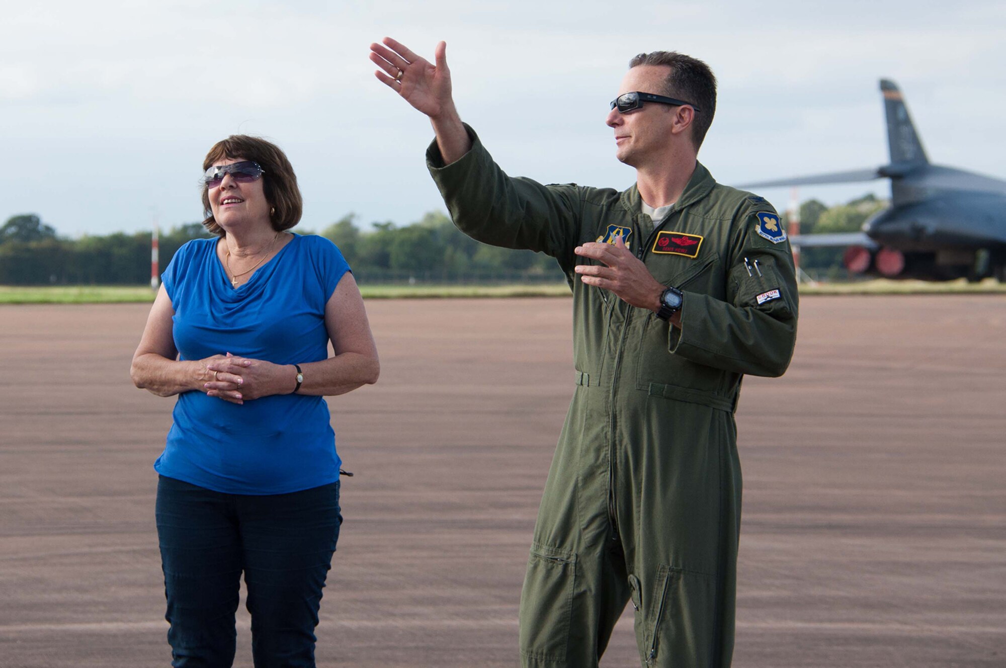 U.S. Air Force Col. Denis Heinz, commander of the 489th Bomb Group, Dyess Air Force Base, Texas, explains the capabilities of the B-1B Lancer with Jennie Sanford, mayor of the town of Fairford, during an aircraft tour Sep. 6, 2016 at Royal Air Force Fairford, England. Heinz deployed to RAF Fairford to participate in Exercise Ample Strike, a Czech Republic led, 18 nation live exercise. (U.S. Air Force photo by 1st Lt. Monique Roux/Released)