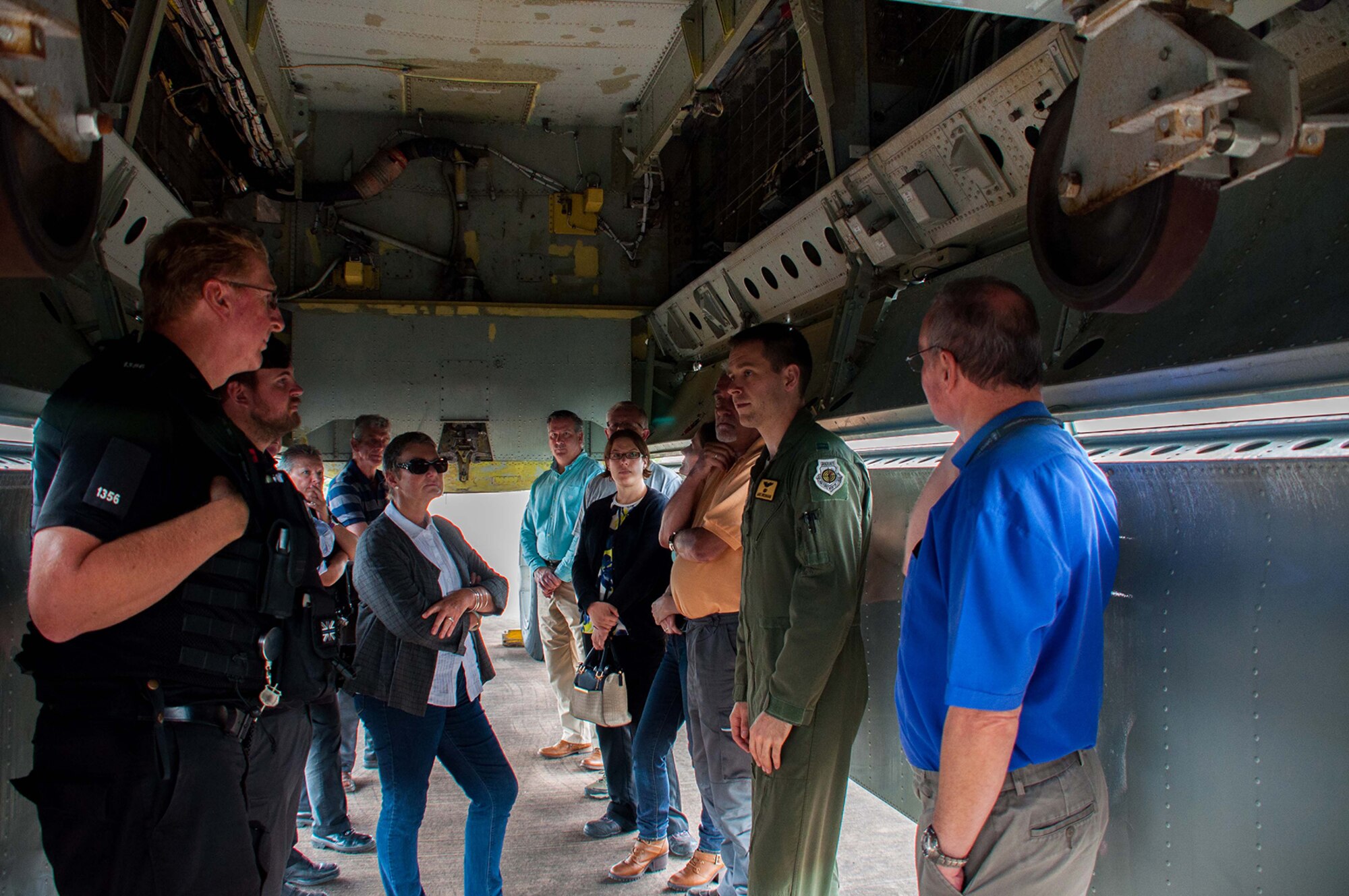U.S. Air Force Capt. James Bresnahan, B-52H Stratofortress pilot, answers questions about the bomber for a group of personnel from Royal Air Force Fairford and community leaders from the town of Fairford, during a base static display tour Sept. 6, 2016 at RAF Fairford, England.  Bresnahan is assigned to the 11th Bomb Squadron, Barksdale Air Force Base, La. and deployed to RAF Fairford to participate in Exercise Ample Strike, a Czech Republic led, 18 nation live exercise. (U.S. Air Force photo by 1st Lt. Monique Roux/Released)