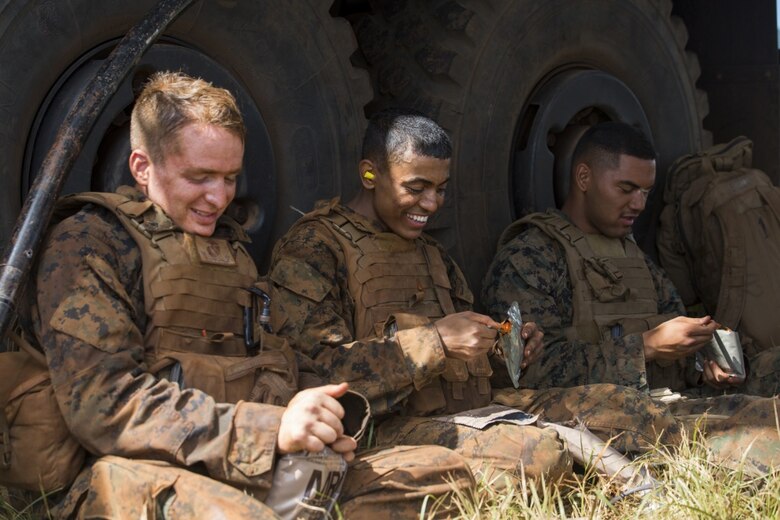 SCHOFIELD BARRACKS – Marines from Bravo Company, “Black Sheep,” 1st Battalion, 12th Marine Regiment, eat chow during an intermission during a training exercise at Schofield Barracks, Sept. 06, 2016. Marines from Bravo Co., “Black Sheep,” 1st Bn., 12th Marines, participated in exercise Spartan Fury 16.4. Spartan Fury is a pre-deployment exercise in which service members conduct live-fire artillery training and unit leaders are able to further assess and improve the lethality of the battalion. (U.S. Marine Corps photo by Lance Cpl. Jesus Sepulveda Torres) 