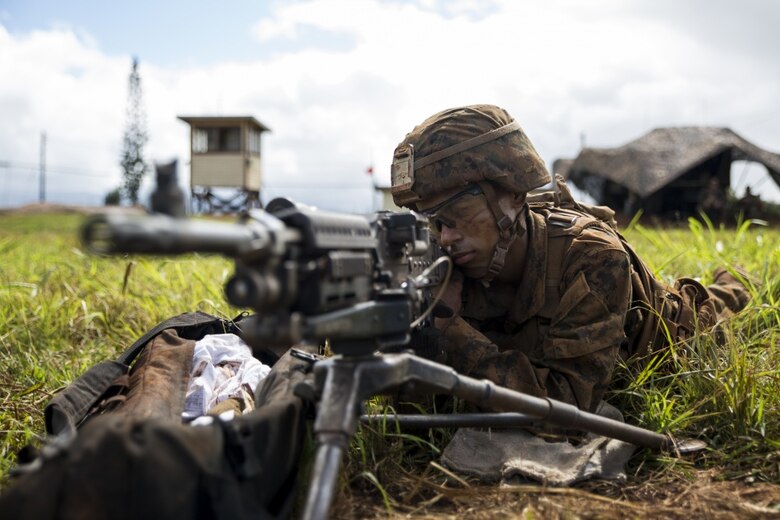 SCHOFIELD BARRACKS – Pfc. Jeremiah Overton, an artilleryman with Bravo Company, “Black Sheep,” 1st Battalion, 12th Marine Regiment, and a Loraine, Ohio, native, provides security with his M240 Machine Gun for M777 Light Weight Towed Howitzers and their artillerymen during a training exercise at Schofield Barracks, Sept. 06, 2016. Marines from Bravo Co., “Black Sheep,” 1st Bn., 12th Marines, participated in exercise Spartan Fury 16.4. Spartan Fury is a pre-deployment exercise in which service members conduct live-fire artillery training and unit leaders are able to further assess and improve the lethality of the battalion. (U.S. Marine Corps photo by Lance Cpl. Jesus Sepulveda Torres) 



LEAVE A COMMENT