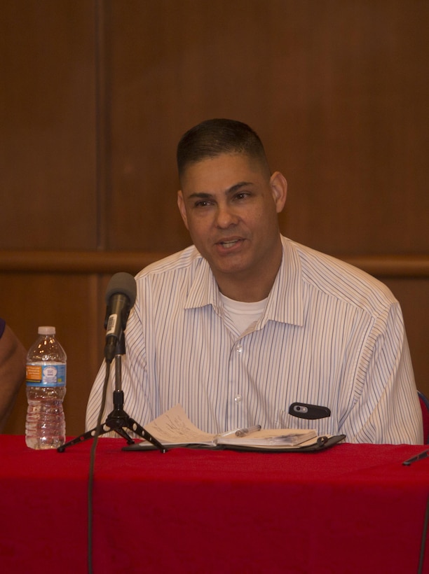 Fernando Guzman, the prevention program director for Marine Forces Reserve’s Marine Corps Community Services, shares his thoughts on suicide prevention after Theater of War’s reading of “Ajax” at Marine Corps Support Facility New Orleans, Sept. 9, 2016. The purpose of Theater of War is to engage military audiences in a discussion of behavioral health and suicide prevention through a dramatic reading of Sophocles’ classic play. (U.S. Marine Corps photo by Sgt. Ian Leones/Released)