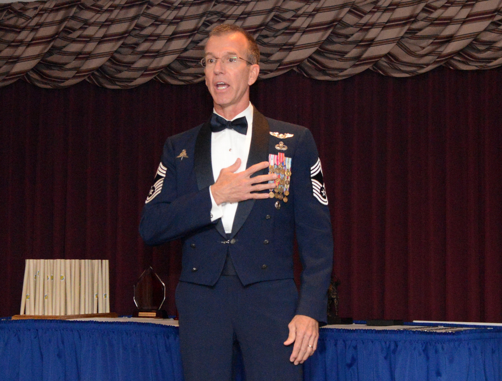 Retired Chief Master Sgt. Ralph Humphrey was the guest speaker at the Sept. 1 Airman Leadership School Graduation. After a distinguished 30-year Air Force career spent mostly as a combat controller, Chief Humphrey currently teaches math at Carl Albert High School and he also taught for four years prior as an Air Force Junior ROTC aerospace instructor.  (Air Force photo by Kelly White)