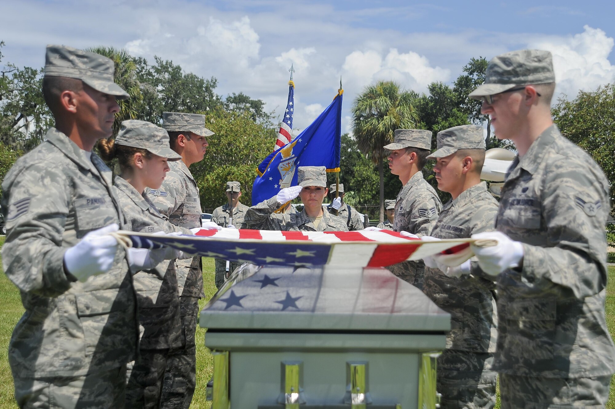Base honor guardsmen practice pallbearer duties during an active-duty full-honors funeral demonstration at MacDill Air Force Base, Fla., Sept. 6, 2016. During the week and a half of training, the U.S. Air Force Honor Guard Mobile Training Team instructed base honor guardsmen from MacDill and surrounding areas on various duties to include flag folding, presentation of the colors, firing party and pallbearing. (U.S. Air Force photo by Airman 1st Class Mariette Adams)