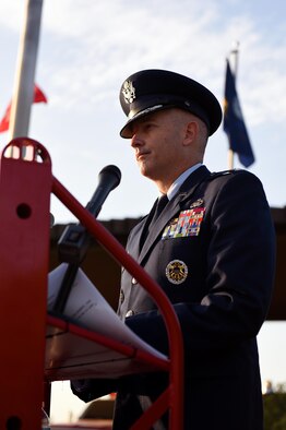 U.S. Air Force Col. Michael Downs, 17th Training Wing Commander, delivers a speech during the 9/11 Remembrance Ceremony at the Department of Defense Fallen Firefighter Memorial on Goodfellow Air Force Base, Texas, Sept. 9, 2016. Downs gave special thanks to emergency responders and gave notice to three bronze plaques on the memorial that displayed the names of 96 military firefighters who have died in the line of duty. (U.S. Air Force photo by Airman 1st Class Caelynn Ferguson/ Released)