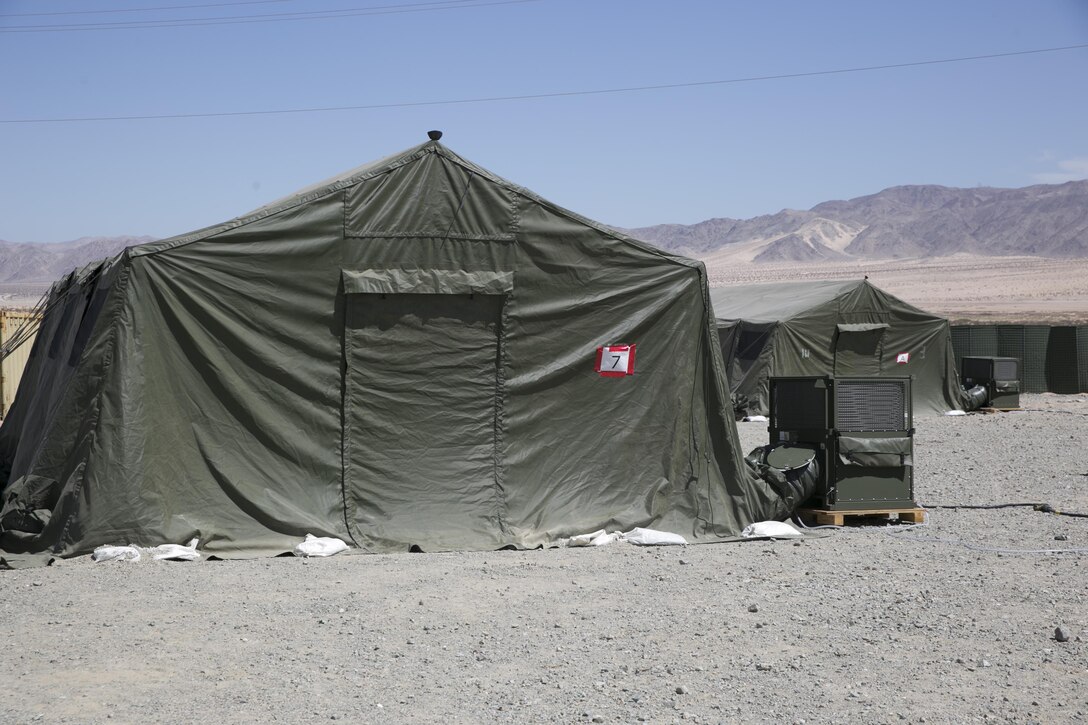 Naval Facilities Engineering and Expeditionary Warfare Center evaluates a variety of products during testing for more efficient tent and environmental control units at Camp Wilson, Sept. 7, 2016.