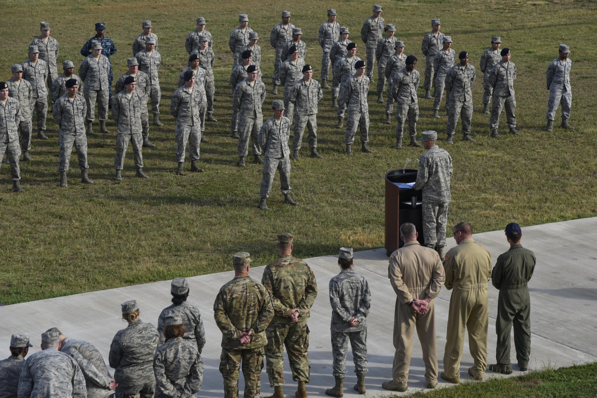 Military members stand in formation during the 9/11 Remembrance Ceremony at Heritage Park on Joint Base Andrews, Md., Sept. 9, 2016. They paid tribute to the first responders and victims of the terrorist attacks 15 years ago. (U.S. Air Force photo by Airman 1st Class Valentina Lopez)