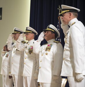 Capt. Mark Vandroff relieves Capt. Rich Blank as the commanding officer at Naval Surface Warfare Center, Carderock Division during the change of command ceremony in West Bethesda, Md.,  Sept. 8, 2016. From left: Lt. Christilene Whalen, command chaplain, Naval Support Activity Bethesda; Vandroff; Blank; Rear Adm. Tom Druggan, commander, Naval Surface Warfare Center; Blank; and Rear Adm. Lorin Selby, chief engineer and deputy commander for Ship Design, Integration and Naval Engineering, Naval Sea Systems Command. (U.S. Navy photo by Ryan Hanyok/Released)

