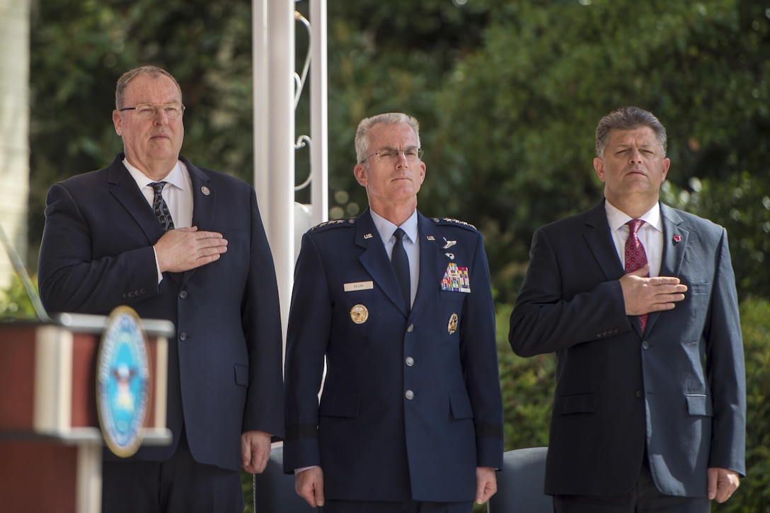 Left to right: Deputy Defense Secretary Bob Work; Air Force Gen. Paul J. Selva, vice chairman of the Joint Chiefs of Staff; and Michael L. Rhodes, the Defense Department's director of administration and management, honor the flag during a remembrance ceremony at the Pentagon, Sept. 9, 2016, to mark the 15th anniversary of 9/11. DoD photo by Army Sgt. Amber I. Smith