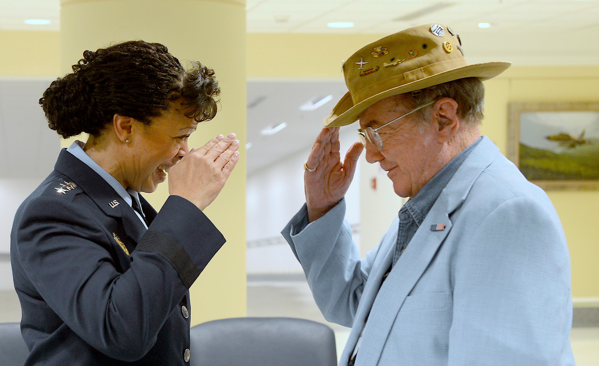 Lt. Gen. Stayce D. Harris, the Air Force assistant vice chief of staff, salutes retired Lt. Col. Robert A. Davis, a former C-7A Caribou command pilot, during a ceremony at the Pentagon in Washington, D.C., Sept. 9, 2016. Davis served during the Vietnam War, and earned two Distinguished Flying Cross medals and a Bronze Star. (U.S. Air Force photo/Andy Morataya)