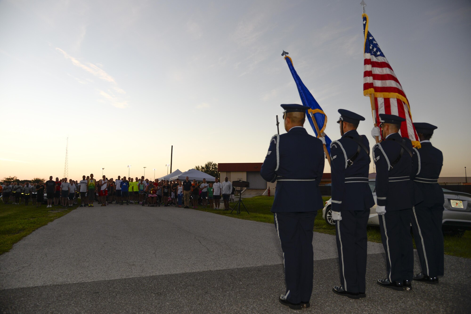 The MacDill Base Honor Guard presents the colors at the start of a 9/11 Memorial 5K at MacDill Air Force Base, Fla., Sept. 9, 2016. The run was held in remembrance of the lives lost in the Sept. 11, 2001 terrorist attacks. (U.S. Air Force photo by Tech. Sgt. Krystie Martinez)
