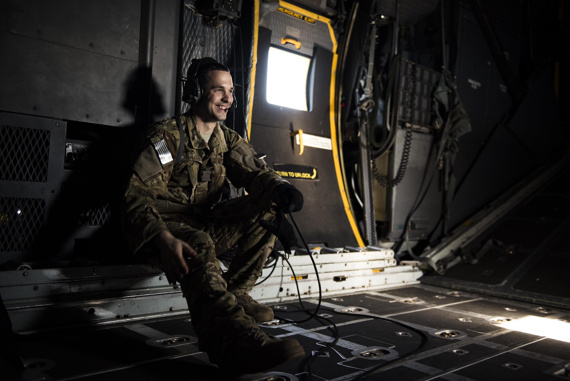 Tech. Sgt. Vincent Telmanik, a loadmaster with the 15th Special Operations Squadron, sits onboard an MC-130H Combat Talon II aircraft during a routine training mission at Hurlburt Field, Fla., Sept. 7, 2016. Combat Talon IIs provide infiltration, exfiltration and resupply of special operations forces and equipment in hostile or denied territory. (U.S. Air Force photo by Staff Sgt. Christopher Callaway)