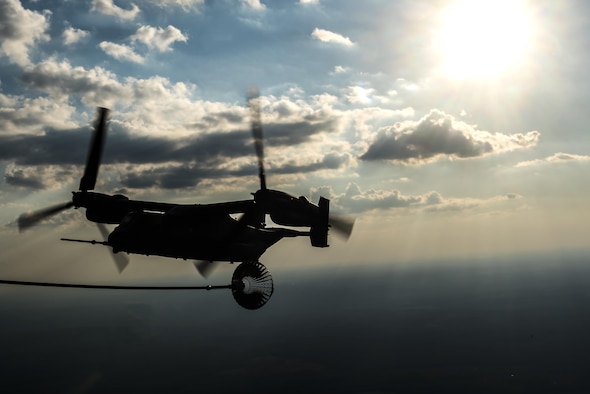 A CV-22 Osprey tiltrotor aircraft approaches an MC-130H Combat Talon II air-refueling receptacle during a training mission at Hurlburt Field, Fla., Sept. 7, 2016. The Osprey is a tiltrotor aircraft that combines the vertical takeoff, hover and vertical landing qualities of a helicopter with the long-range, fuel efficiency and speed characteristics of a turboprop aircraft. (U.S. Air Force photo by Staff Sgt. Christopher Callaway) 