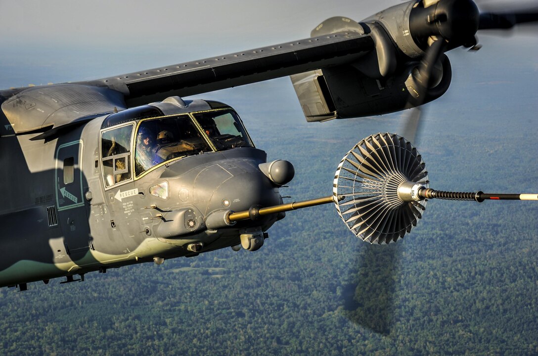 A CV-22 Osprey tiltrotor aircraft approaches an MC-130H Combat Talon II air-refueling receptacle during a training mission at Hurlburt Field, Fla., Sept. 7, 2016. The Osprey combines the vertical takeoff, hover and vertical landing qualities of a helicopter with the long-range, fuel efficiency and speed characteristics of a turboprop aircraft. (U.S. Air Force photo by Airman 1st Class Joseph Pick)