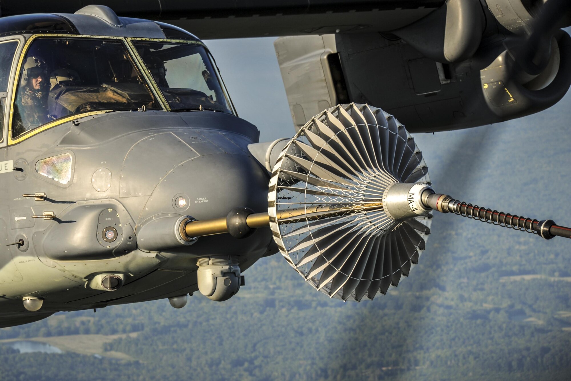 A CV-22 Osprey connects to an MC-130H Combat Talon II air-refueling receptacle during a training mission at Hurlburt Field, Fla., Sept. 7, 2016. The Osprey is a versatile, self-deployable aircraft that offers increased speed and range over other rotary-wing aircraft, enabling Air Force Special Operations Command aircrews to execute long-range special operations missions. (U.S. Air Force photo by Airman 1st Class Joseph Pick)