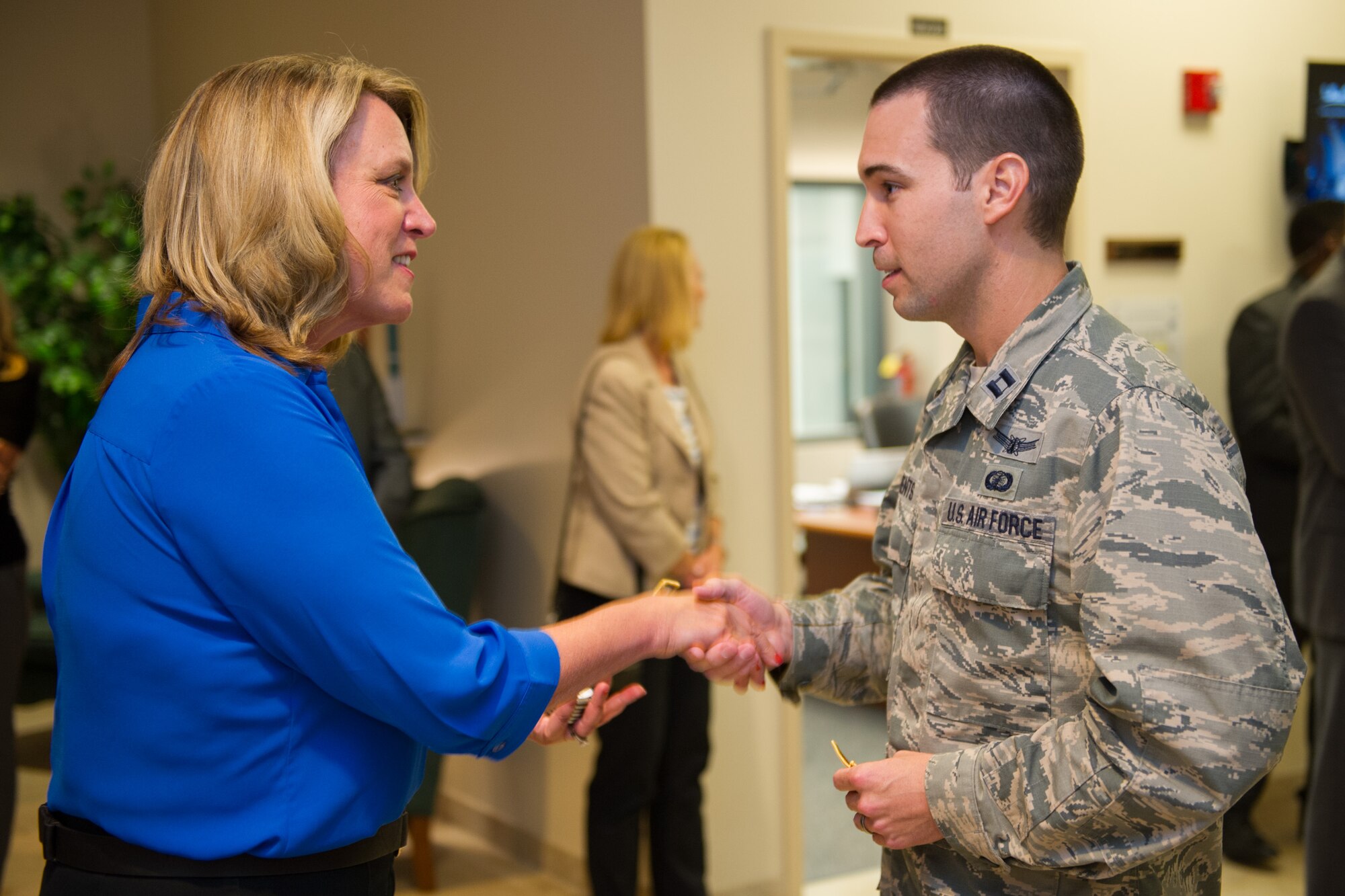 The Honorable Deborah Lee James Secretary of the Air Force receives a mission patch from Capt. Kyle Clements, 5th Space Launch Squadron, prior to the Atlas V launch Sept. 8, 2016, at Cape Canaveral Air Force Station, Fla.  (U.S. Air Force photo/Matthew Jurgens)