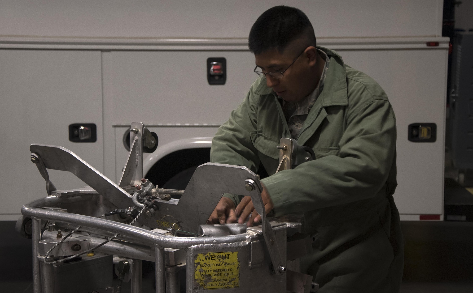 Senior Airman Jaime Sibri Llapa, 90th Missile Maintenance Squadron maintainer, inspects a guided missile maintenance platform at F.E. Warren Air Force Base, Wyo., Aug. 22, 2016. Maintainers inspected their equipment and prepared their vehicles before departing for the missile field. The 90th MMXS maintains 150 Minuteman III ICBMs and the associated launch facilities spread across three states and 9,600 square-miles. (U.S. Air Force photo by Senior Airman Brandon Valle)
