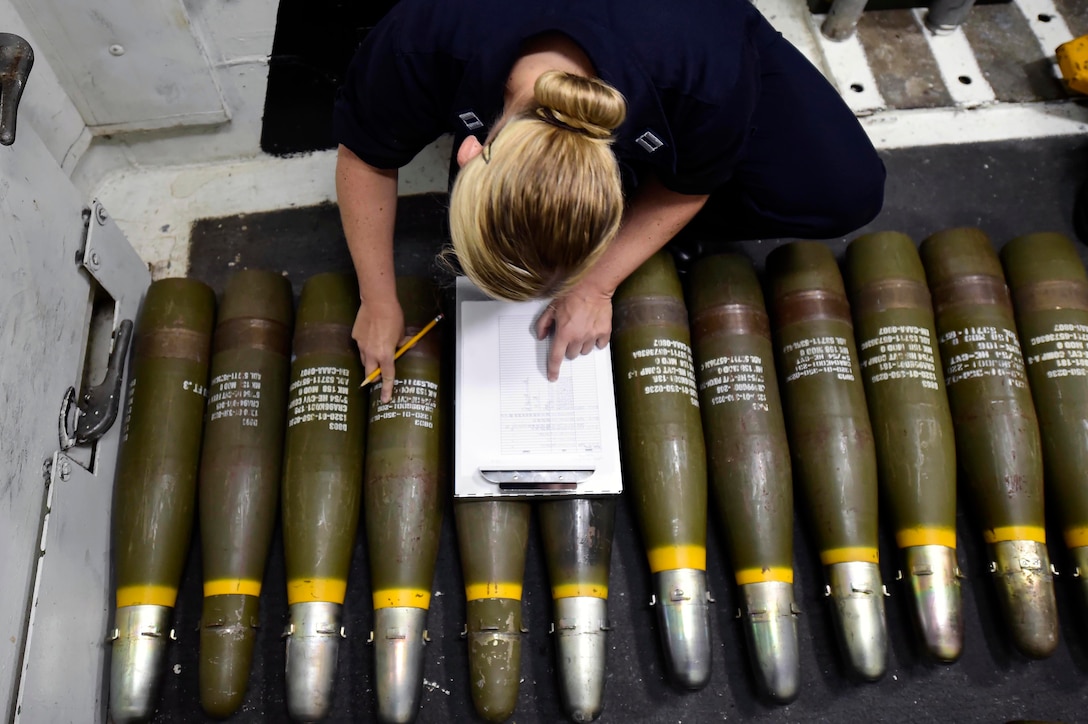 Navy Lt. Carleigh Gregory takes inventory of 5-inch ammunition aboard the USS Ross in Souda Bay, Greece, Sept. 7, 2016. The Ross, a guided-missile destroyer, is conducting naval operations in the U.S. 6th Fleet Area of Operations to support U.S. national security interests in Europe and Africa. Navy photo by Petty Officer 1st Class Theron J. Godbold