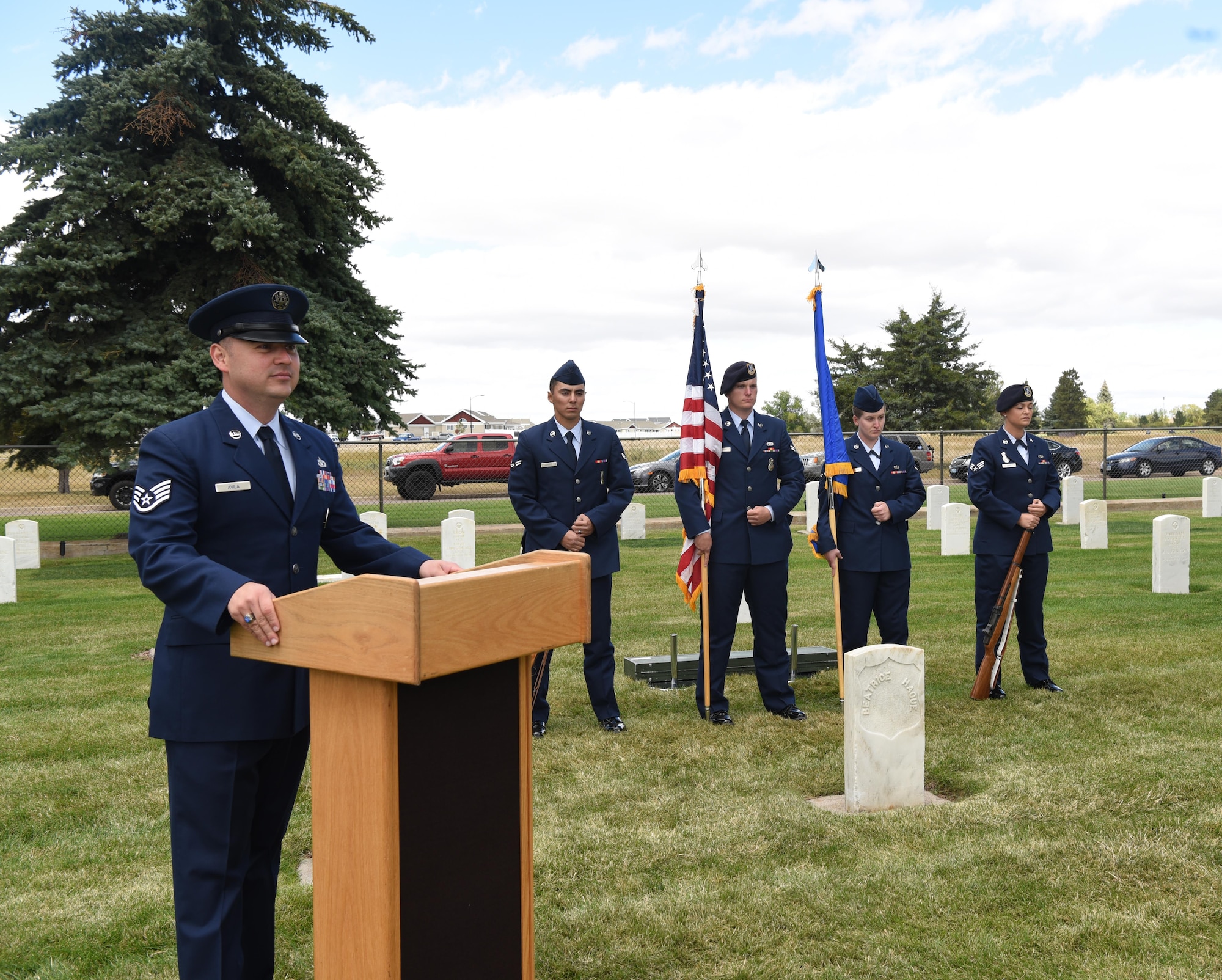 Staff Sgt. Jonathan Avila, 90th Civil Engineer Squadron water and fuels maintenance supervisor, prepares to address the audience during the honor guard graduation on F.E. Warren Air Force Base, Wyo. Sept. 9. Graduates showcased their precision movements during the ceremony. (U.S. Air Force photo by Airman 1st Class Breanna Carter)