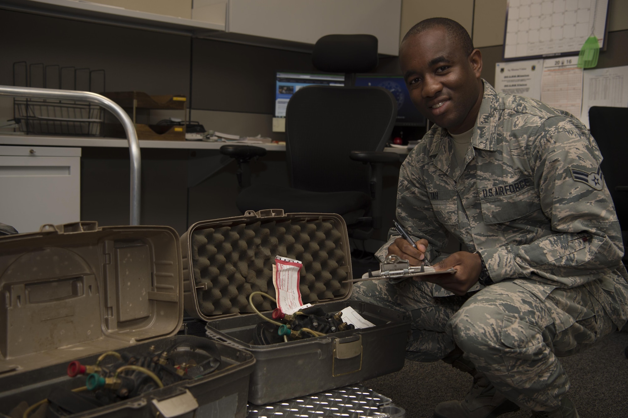 Airman 1st Class Ndap Tah, 90th Logistics Readiness Squadron equipment accountability element, poses for a photo while he quality checks equipment at F.E. Warren Air Force Base, Wyo., Sept. 7, 2016. The 90th LRS provides the full spectrum of agile logistical support to the world’s premier combat-ready ICBM force. (U.S. Air Force photo by Staff Sgt. Christopher Ruano)