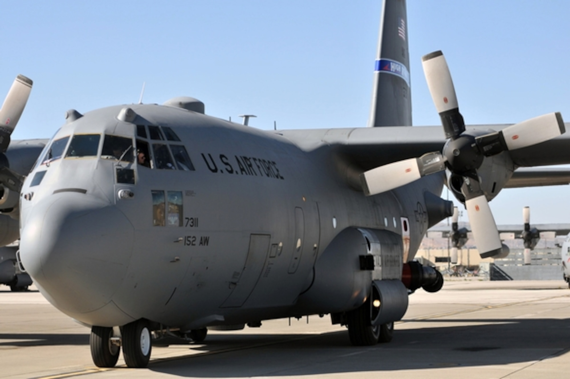 The first 152nd C-130 equipped with U.S. Forest Service's Modular Airborne Fire Fighting System arrived Thursday, Sept. 8, 2016, at the Nevada Air National Guard Base in Reno. The unit completed its first fire fighting mission as co-pilots augmented with the Air Expeditionary Group last week. The 152nd was picked to become a MAFFS unit in April. U.S. Air Force Air National Guard photo by Tech. Sgt. Emerson Marcus