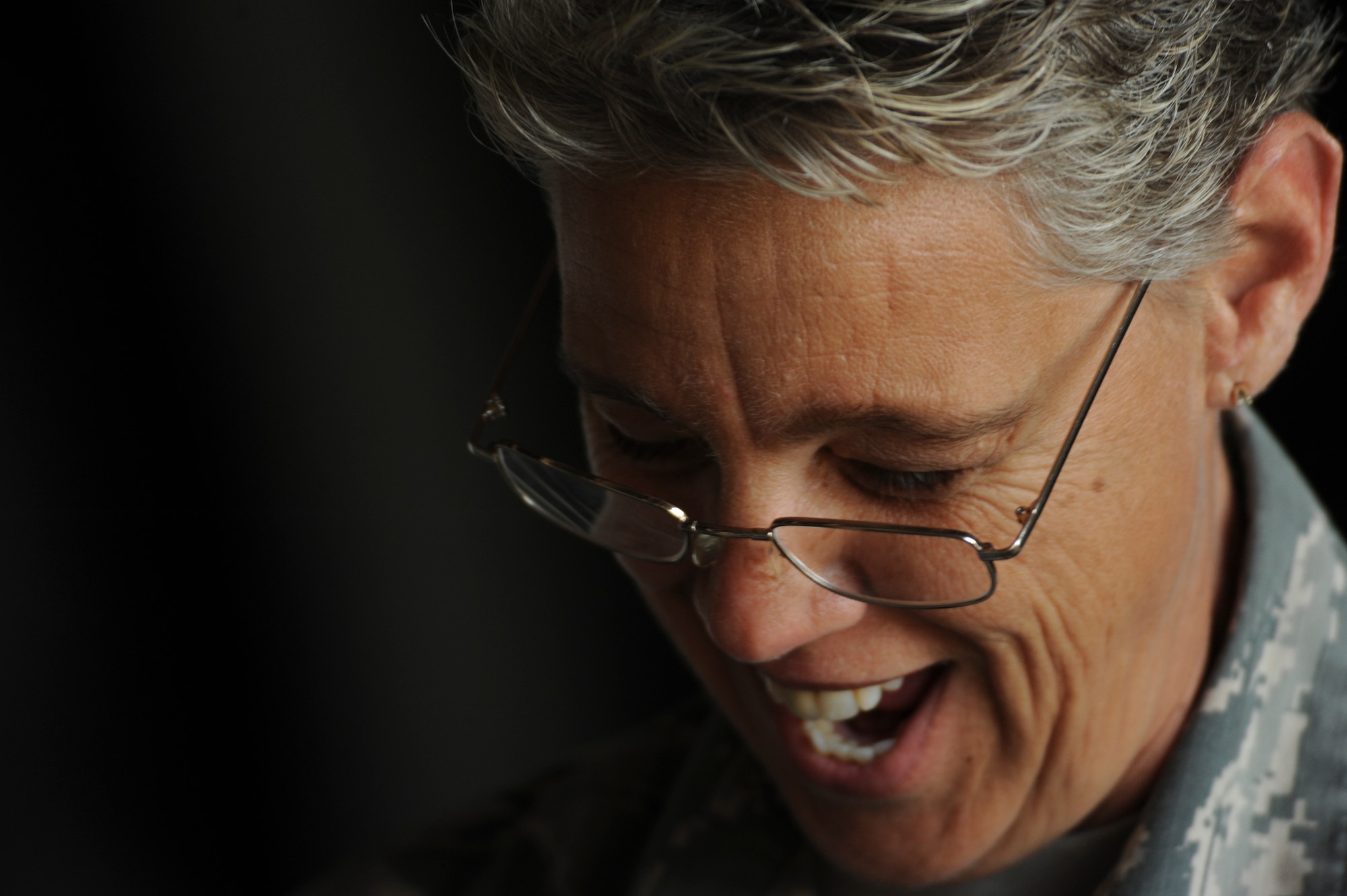 California Air National Guard Chief Master Sgt. Dawn Gillaspy, 194th Expeditionary Fighter Squadron equipment maintenance superintendent, smiles while speaking with Airmen at Graf Ignatievo, Bulgaria, Sept. 8, 2016. Four of the squadron’s F-15C Eagle fighter aircraft will conduct joint NATO air policing missions with the Bulgarian air force to police the host nation’s sovereign airspace Sept. 9-16, 2016. The squadron forward deployed to Graf Ignatievo from Campia Turzii, Romania, where they serve on a theater security package deployment to Europe as a part of Operation Atlantic Resolve. (U.S. Air Force photo by Staff Sgt. Joe W. McFadden) 