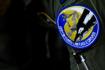 A 194th Expeditionary Fighter Squadron patch remains affixed to the flightsuit of a California Air National Guard F-15C Eagle fighter aircraft pilot inside the squadron’s flight operations room at Graf Ignatievo, Bulgaria, Sept. 8, 2016. Four of the squadron’s F-15Cs will conduct joint NATO air policing missions with the Bulgarian air force to police the host nation’s sovereign airspace. The squadron forward deployed to Graf Ignatievo from Campia Turzii, Romania, where they serve on a theater security package deployment to Europe as a part of Operation Atlantic Resolve. (U.S. Air Force photo by Staff Sgt. Joe W. McFadden) 