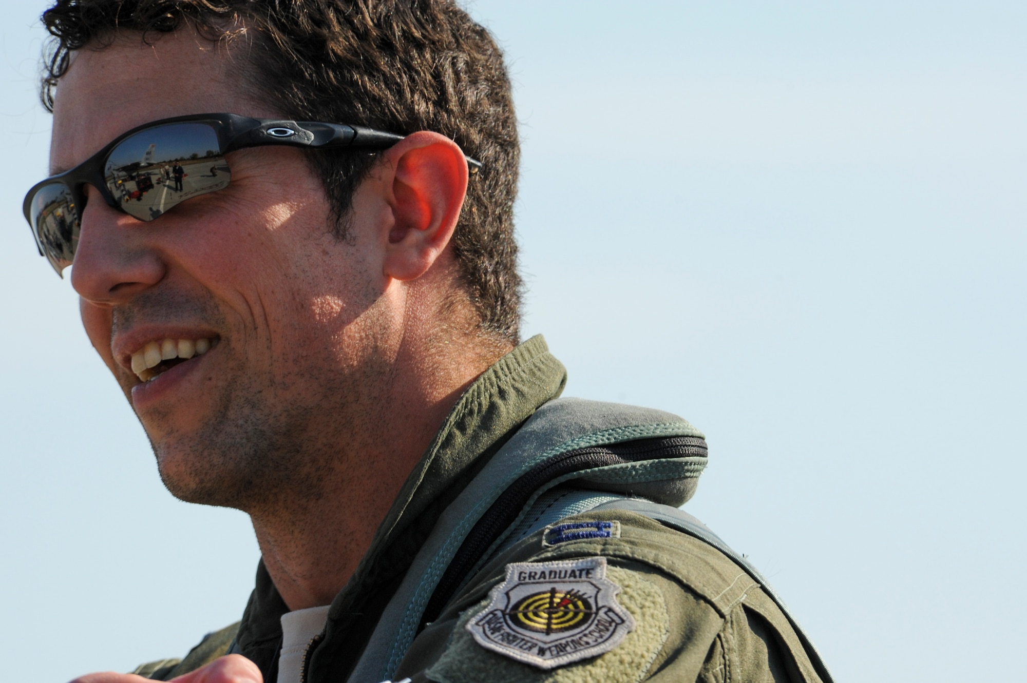 California Air National Guard Capt. Matthew Young, a 194th Expeditionary Fighter Squadron F-15C Eagle fighter aircraft pilot, speaks with crew chiefs on the flightline at Graf Ignatievo, Bulgaria, Sept. 8, 2016. Four of the squadron’s F-15Cs will conduct joint NATO air policing missions with the Bulgarian air force to police the host nation’s sovereign airspace. The squadron forward deployed to Graf Ignatievo from Campia Turzii, Romania, where they serve on a theater security package deployment to Europe as a part of Operation Atlantic Resolve. (U.S. Air Force photo by Staff Sgt. Joe W. McFadden) 