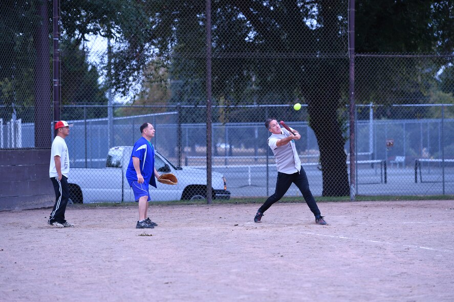 Canadian Warrant officer Gilles Turgeon hits a fly ball to center field during the Western Air Defense Sector U.S. vs Canada Softball Challenge Cup Sept. 1.  The U.S. won with a final score of 22 to 7. (U.S. Air National Guard photo by Capt. Kimberly D. Burke)