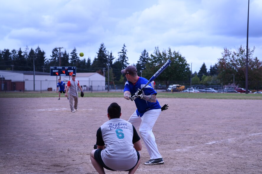 Canadian pitcher Richard Martin is no match for American Kevin Blackwell as he hits to center field and singles during the fourth inning.  The U.S. team won the Western Air Defense Sector’s U.S. vs Canada Softball Challenge Cup at the McChord Sports Complex Sept. 1 by a final score of 22 to 7. (U.S. Air National Guard photo by Capt. Kimberly D. Burke)