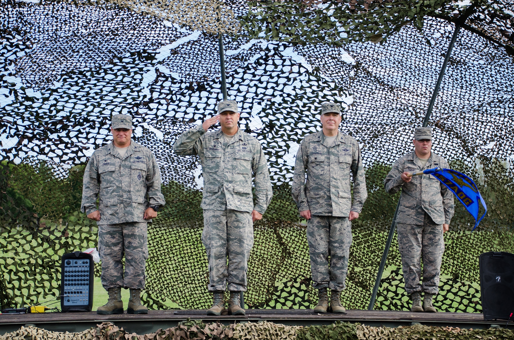 Col. Bill Boothman took command of the Missouri Air National Guard's 157th Air Operations Group during a change of command ceremony on the Parade Field at Jefferson Barracks, Missouri, Sept 10, 2016.  L to r: 131st Bomb Wing commander Col Ken Eaves, Col Bill Boothman, outgoing 157th commander Col Rick Chapman, Technical Sgt. Nicholas Conrad. (U.S. Air National Guard photo by Staff Sgt. Brittany Cannon)