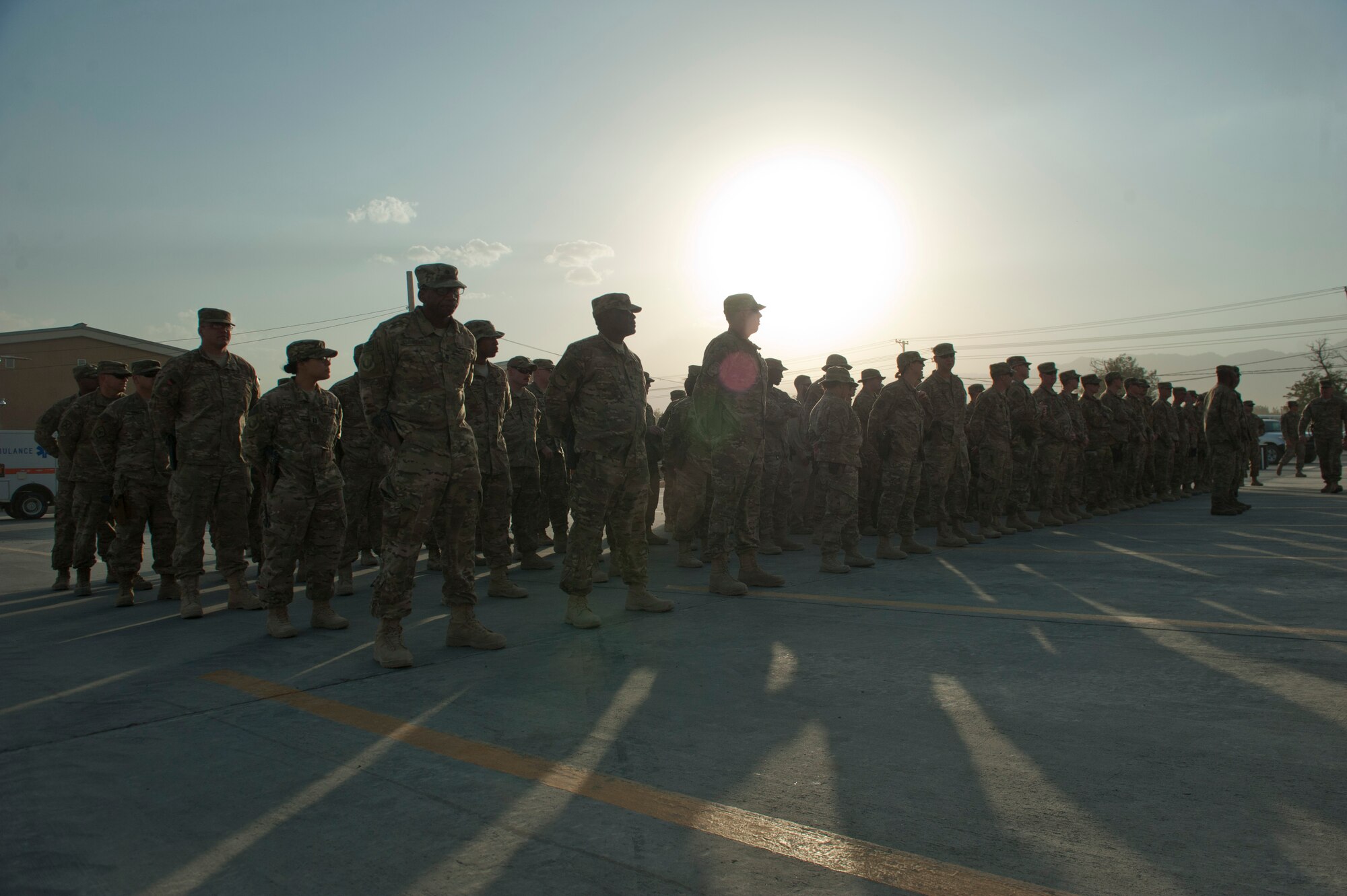 Servicemembers and civilians at Bagram Airfield, Afghanistan gathered to hold a 9/11 remembrance ceremony, Sept. 11, 2016. The ceremony involved a joint service honor guard  that conducted a retreat to remember those who gave their lives 15 years ago. (U.S. Air Force photo by Capt. Korey Fratini)