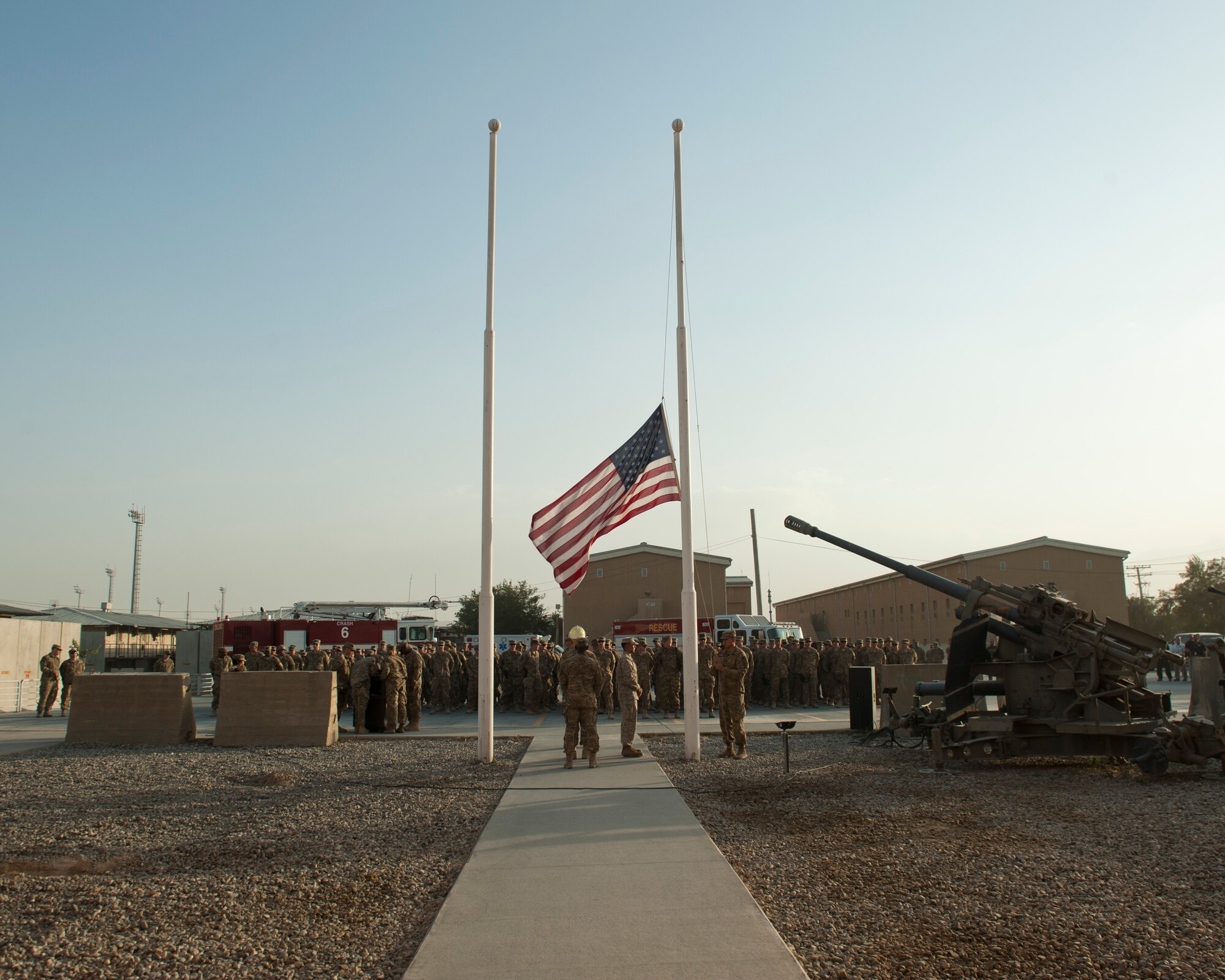 Servicemembers and civilians at Bagram Airfield, Afghanistan gathered to hold a 9/11 remembrance ceremony, Sept. 11, 2016. The ceremony involved a joint service honor guard  that conducted a retreat to remember those who gave their lives 15 years ago. (U.S. Air Force photo by Capt. Korey Fratini)