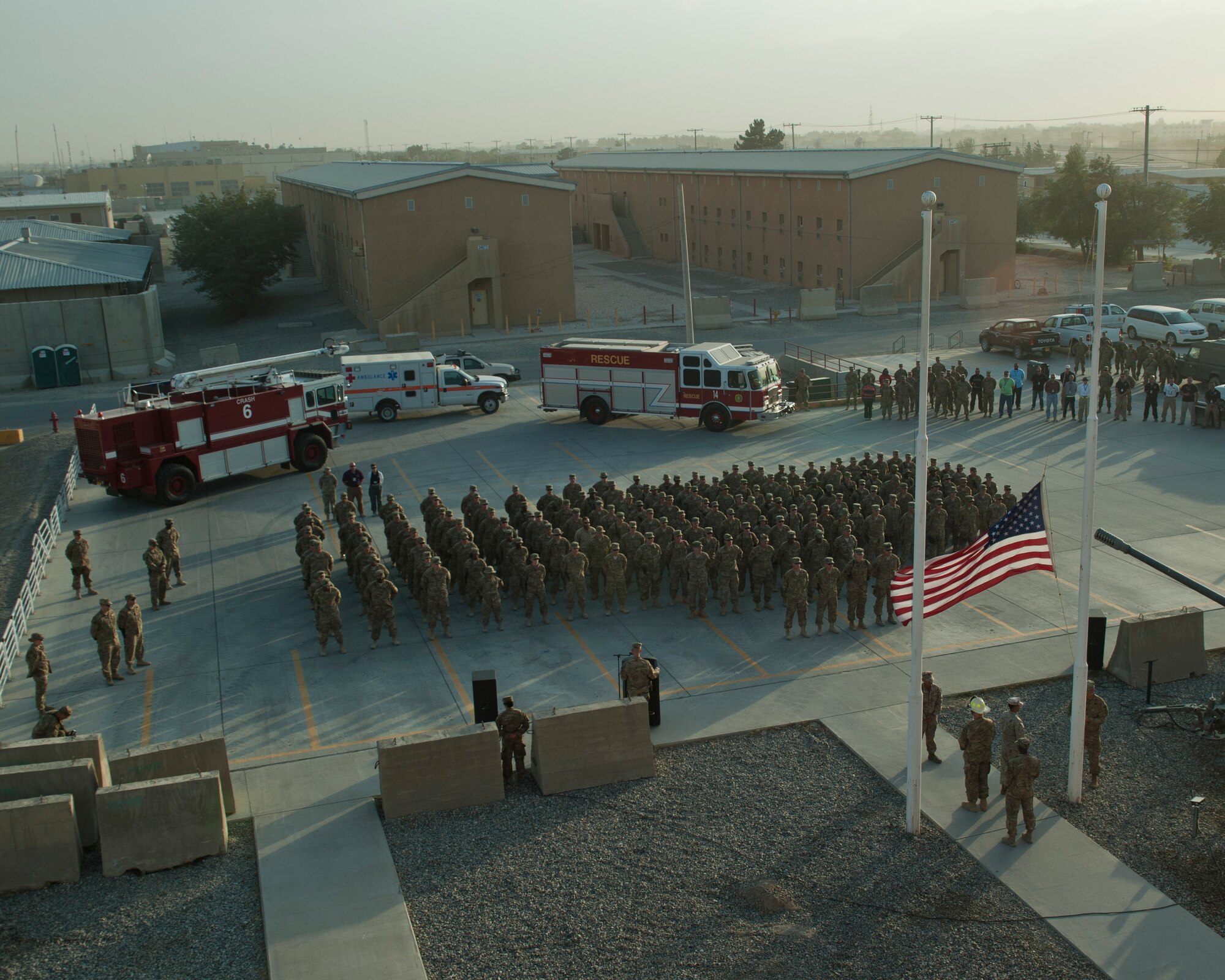 Servicemembers and civilians at Bagram Airfield, Afghanistan gathered to hold a 9/11 remembrance ceremony, Sept. 11, 2016. The ceremony involved a joint service honor guard  that conducted a retreat to remember those who gave their lives 15 years ago. (U.S. Air Force photo by Capt. Korey Fratini)