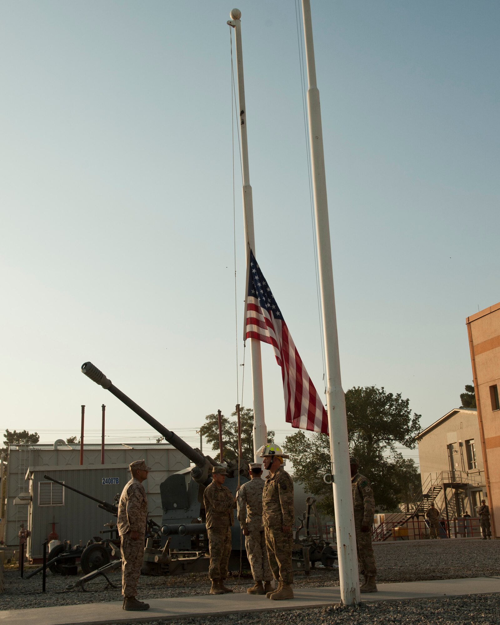 Servicemembers and civilians at Bagram Airfield, Afghanistan gathered to hold a 9/11 remembrance ceremony, Sept. 11, 2016. The ceremony involved a joint service honor guard  that conducted a retreat to remember those who gave their lives 15 years ago. (U.S. Air Force photo by Capt. Korey Fratini)