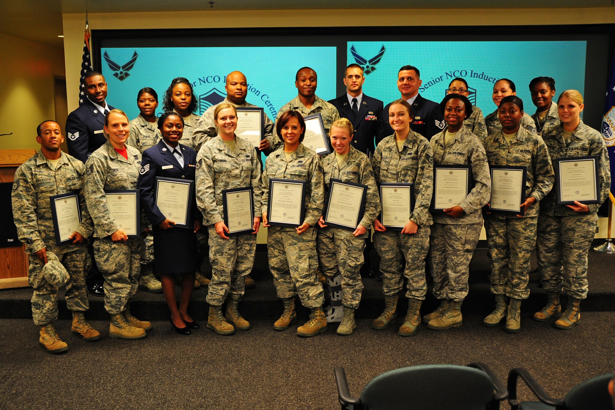 Members of the 315th Airlift Wing celebrated the promotions of several Airmen in a noncommissioned officer and senior noncommissioned officer induction ceremony at Joint Base Charleston, S.C. Sept. 10, 2016. Those promoted were challenged to lead and care for their subordinate Airman (U.S. Air Force photo by Senior Airman Jonathan Lane).