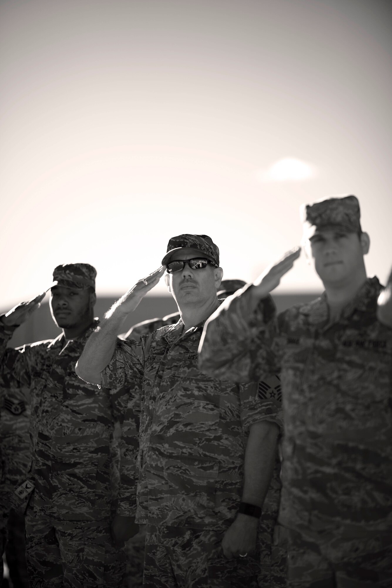 Members of the 914th Airlift Wing render a salute during the 15th anniversary remembrance of the 9/11 terrorist attacks, September 11, 2016, Niagara Falls Air Reserve Station, N.Y. (U.S. Air Force photo by Tech. Sgt. Steph Sawyer) 