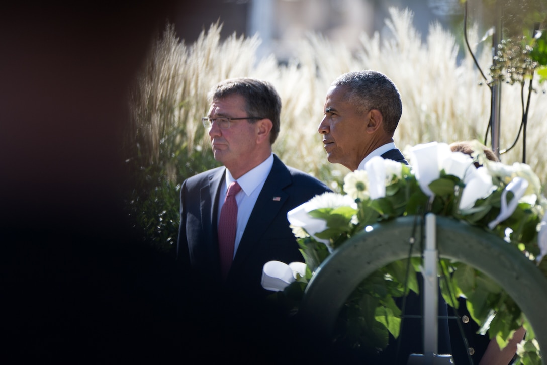 President Barack Obama and Defense Secretary Ash Carter enter the National 9/11 Pentagon Memorial after laying a wreath at the entrance at the Pentagon in Arlington, Va. Sept. 11, 2016. DoD photo by EJ Hersom