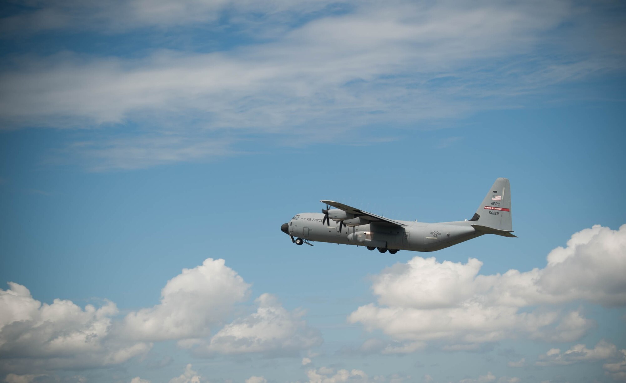 A C-130J Super Hercules from the 815th Airlift Squadron takes off from Keesler Air Force Base as part of a four-ship formation Sept. 11. This formation came after the activation of the new 803rd Aircraft Maintenance Squadron, which will be dedicated to the maintenance and repair of the 10 815th AS aircraft. (U.S. Air Force photo/Senior Airman Heather Heiney)